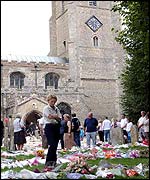 Floral tributes to Holly Wells and Jessica Chapman in St Andrew's Church, Soham