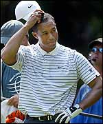 Woods spoiled his round with a bogey-bogey finish