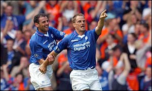 Ronald de Boer scores the opening goal for Rangers after 32 minutes 