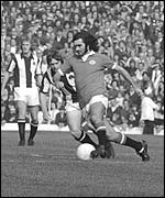 George Best in action for Manchester United