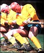 Tug of war competitors in action