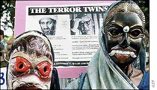 Masked protesters demonstrate outside court against the moves