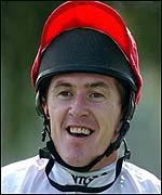 McCoy smiles after racking up his 1,700th winner