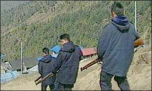 Nepalese policemen on patrol in rebel-infested hill country