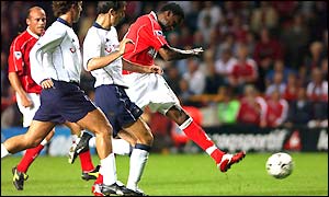 Charlton's Jason Euell drives for a goal