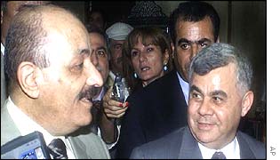 Syrian Prime Minister Mohammad Moustafa Miro, right, and Iraqi Vice President Taha Yassin Ramadan