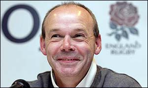 A relaxed Clive Woodward smiles at a news conference