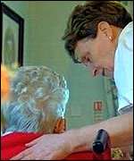 Elderly person and carer