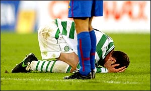 Chris Sutton holds his head in his hands after a glaring miss