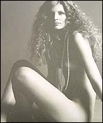 A naked Pringle model in pearls