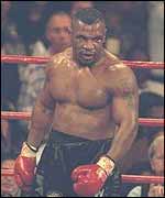 Mike Tyson glowers at the referee