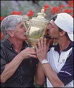 Goran Ivanisevic and his father pose with the Wimbledon trophy