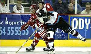 Robby Sandrock (white) of Belfast in action against Viktor Torstensson of Troja Ljungby