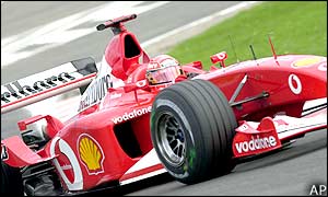 World champion Michael Schumacher improves his pole position time to 1:43.726 to make sure his Ferrari starts on the front row of the grid