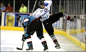 Giants Colin Ward shrugs aside Thomas Bergamelli of Mulhouse on Saturday night