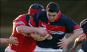 Llanelli fly-half Stephen Jones is stopped in his tracks