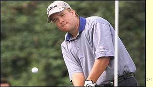 Craig Barlow plays a chip shot during his third round