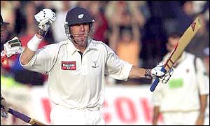 Matthew Elliott celebrates his C&G final century