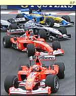Michael Schumacher leads Rubens Barrichello, Kimi Raikkonen, Jarno Trulli and Juan Pablo Montoya at the start of the Belgian Grand Prix