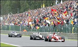 Rubens Barrichello leads from KImi Raikkonen and Juan Pablo Montoya as the trio fight for second place