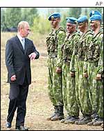 President Vladimir Putin inspects troops