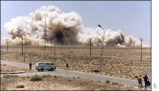 UN inspectors destroy an Iraqi building