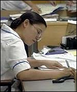 Casualty nurse writing