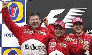 Ferrari's Ross Brawn (left), Rubens Barrichello (centre) and Michael Schumacher