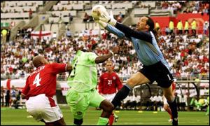 England's David Seaman foils Opabunmi's move at the 2002 World Cup