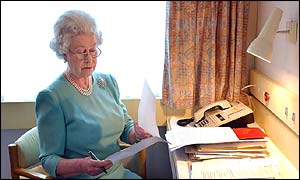 The Queen at work at her desk on the Royal Train