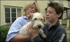 Wellie, the wire-haired terrier and his original owners