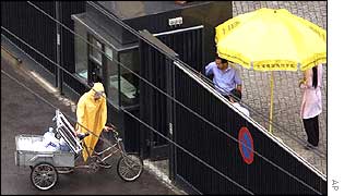 Supplies being taken into compound