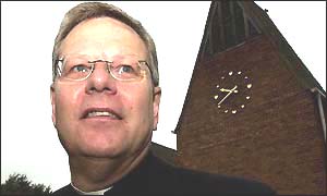 Rev Harry Brown arrives at the Church of the Holy Redeemer