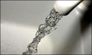 Water running from kitchen tap