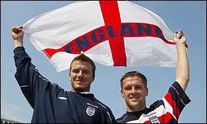 David Beckham (left) is replaced by Michael Owen (right)