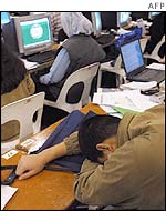 Summit reporter asleep on desk