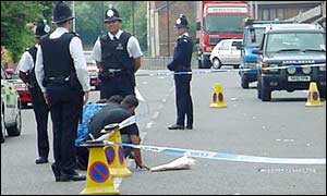 Mr Bahmani's relatives lay flowers