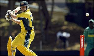 Australian opener Adam Gilchrist cuts a stray Kenyan delivery