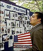 Pictures of the missing on a board in New York