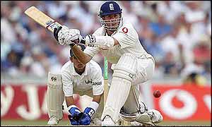 Michael Vaughan sweeps against India during the Fourth Test