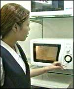 Girl with Sharp microwave