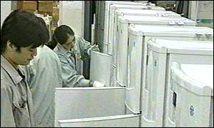 Workers at Sharp fridge factory