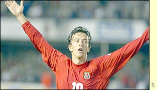 Simon Davis celebrating scoring the second goal for Wales
