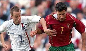 Lee Bowyer battles with Portugal's Luis Figo