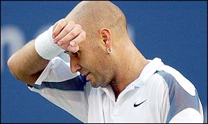 Sampras breaks Agassi's serve in the first game of the second set and serves out the rest of the set 