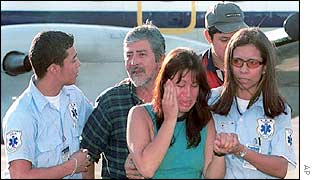 Released hostages Adriana de los Santos and Oscar Hernandez