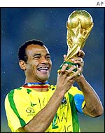 Brazil's Cafu holds the World Cup 