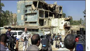 Camera crews are taken to the ruined Tamoz nuclear plant, 40km from Baghdad, on Monday