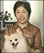 Wu Hong Yan and Lucky the dog