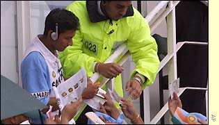 India's Sanjay Bangar signs autographs for the fans